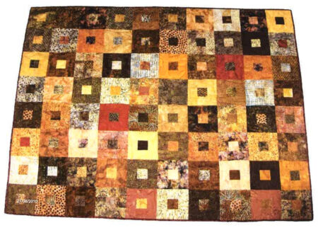 Mønster – Tæppe med firkanter i brun-gylden