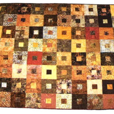 Mønster – Tæppe med firkanter i brun-gylden